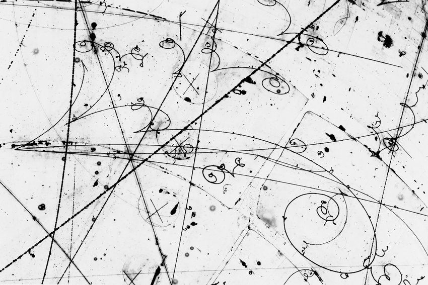 An-example-of-tracks-captured-by-a-bubble-chamber-These-images-were-typically-manually.jpg