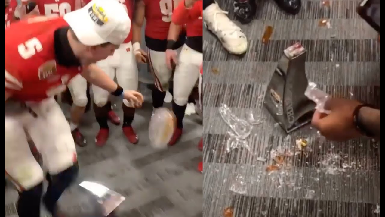 mertz dropping trophy.jpg